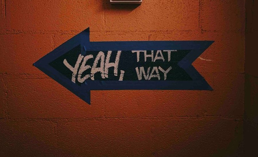 blue and black arrow signage